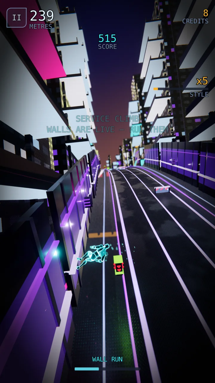 Wall run along a lit building face.